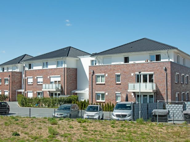 Neubau eines Mehrfamilienhauses mit 22 Wohneinheiten und einer Teilunterkellerung